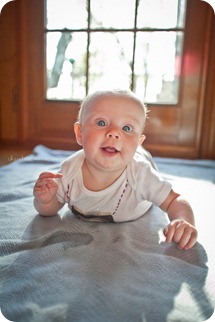 Little Charlotte models the assistant onesie showing her excitement to assist Chocolate Moose Images