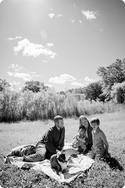 A beautiful family of 5 with 2 kiddos and a pit bull had portraits taken on a spring morning in Minnesota by Chocolate Moose Images