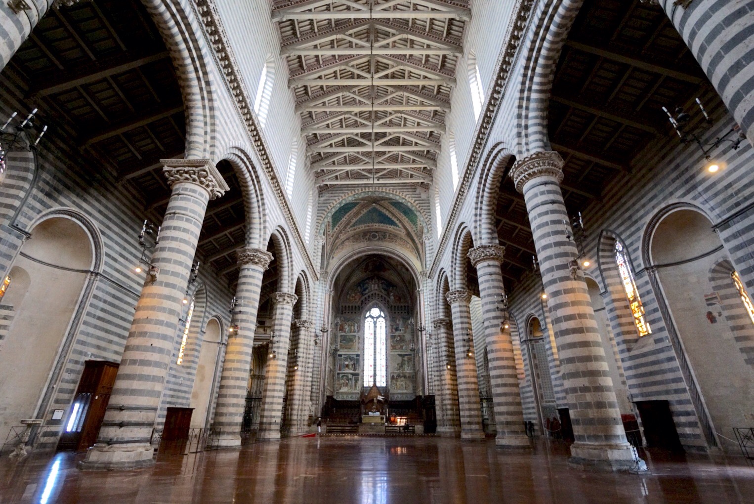 inside the duomo of Orvieto showing off its stripes